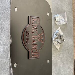 Ford OEM King Ranch Black License Plate with hardware. New, never used.
